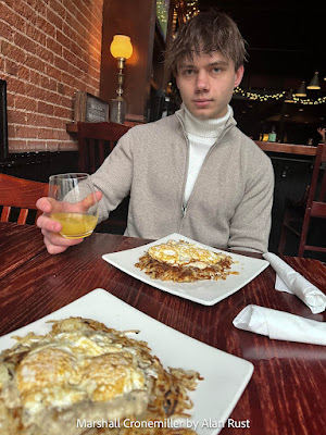 Marshall having brunch with orange juice