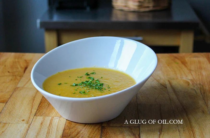 Curried Vegetable Soup in a white bowl.