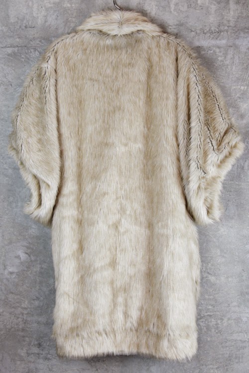 http://www.swankboutiqueonline.com/oversized-fur-shrug/