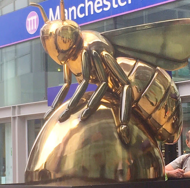 Manchester bee outside Piccadilly station