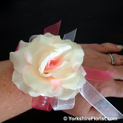  pink silk rose wrist corsage on pearl bracelet 
