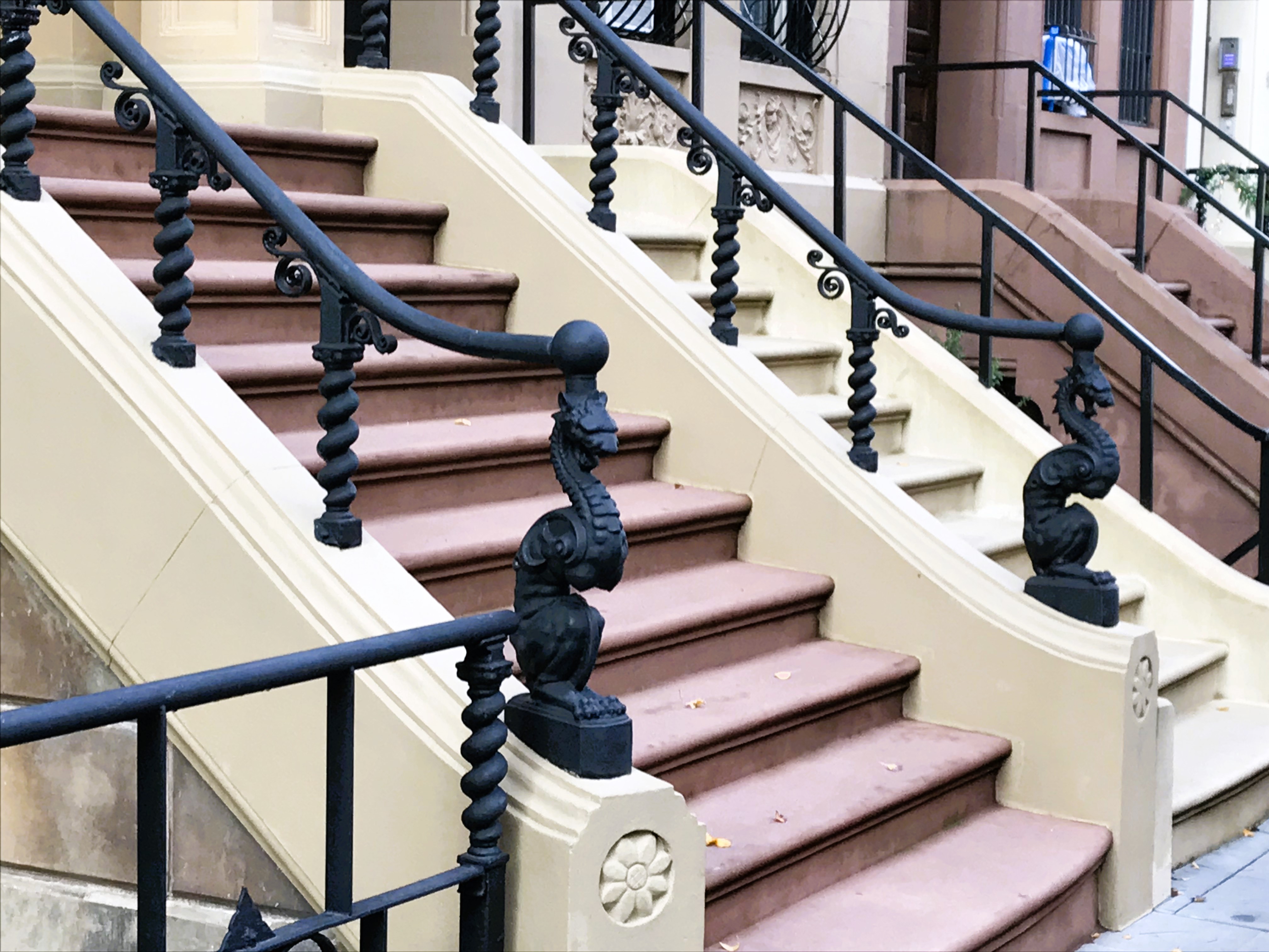 Downtown labeled staircase leading to the lower level of the pottery barn  in the flatiron district, Manhattan, NYC, USA Stock Photo - Alamy