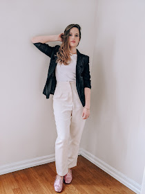 Nyc fashion blogger Kathleen Harper wearing a neutral white outfit with a black blazer.