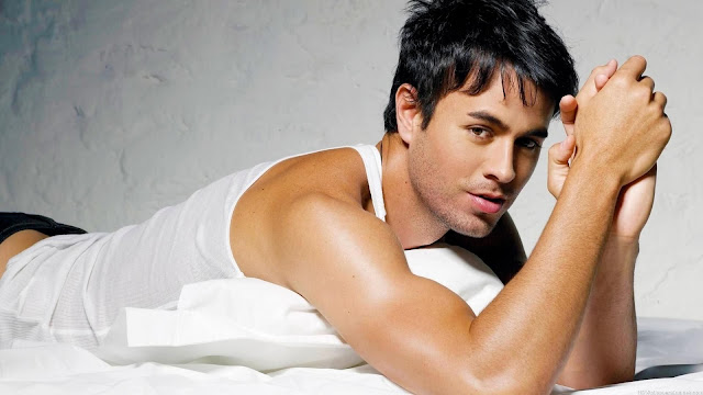 Dímelo - Enrique Iglesias: testo, video e traduzione