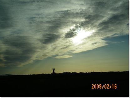wind tunnel / awesome cloud formation with sun behind