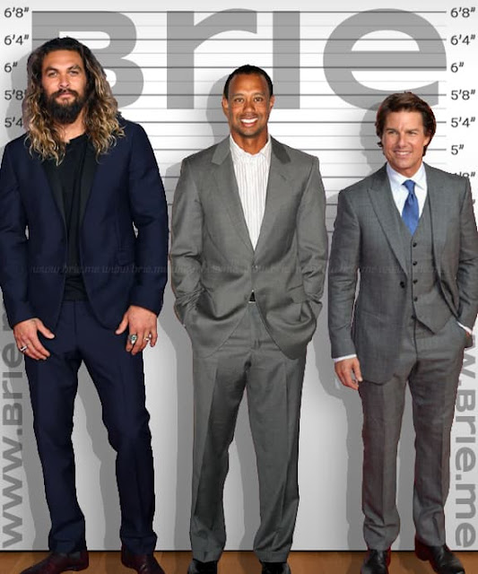 Tiger Woods standing with Jason Momoa and Tom Cruise