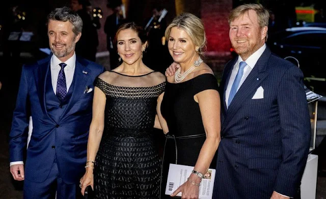 Crown Princess Mary wore a Temperley London gown. Queen Maxima wore a Carolina Herrera dress