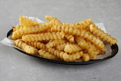 Domino's Australia's crinkle-cut fries with Pizza Salt.