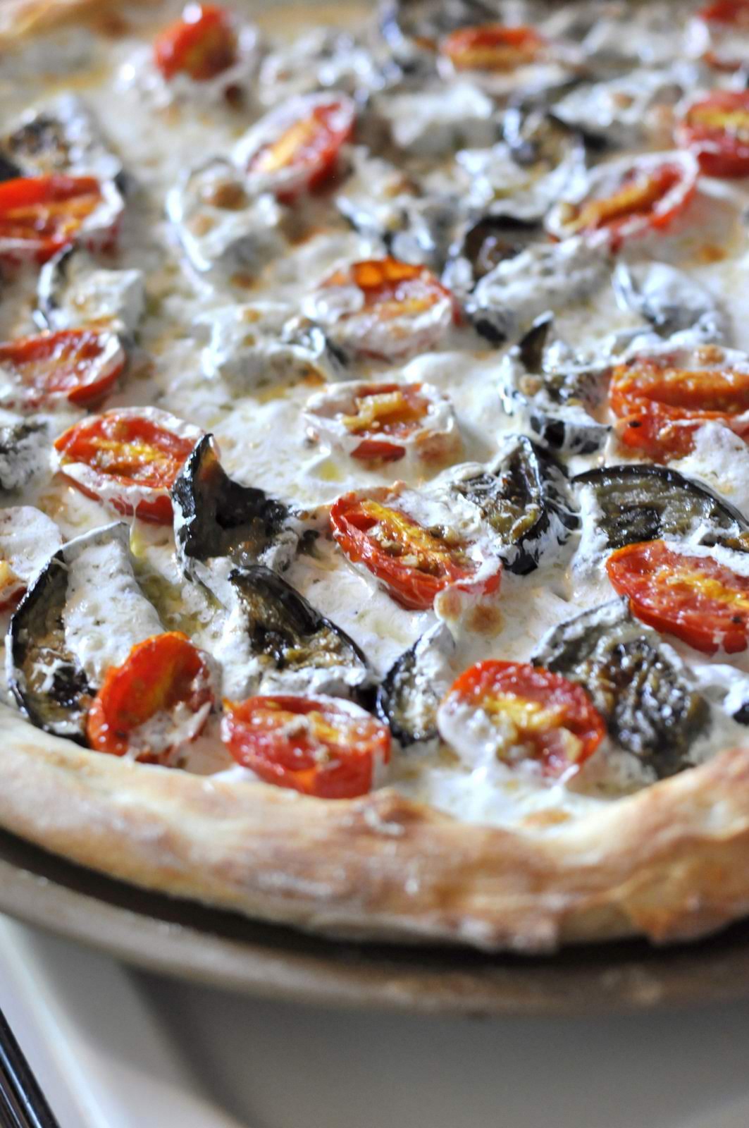 Pizza with Eggplant, Grape Tomatoes, and Fresh Mozzarella on Taste As You Go.