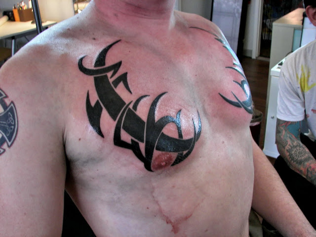 tribal tattoos for men on chest. chest tattoos for men. Tribal