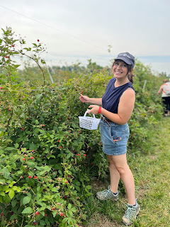 Sam picking blackberries