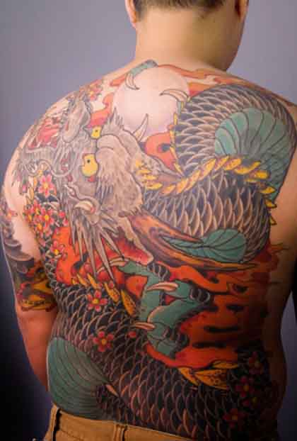 The Free koi tattoo designs come in a variety of colors, including yellow, 