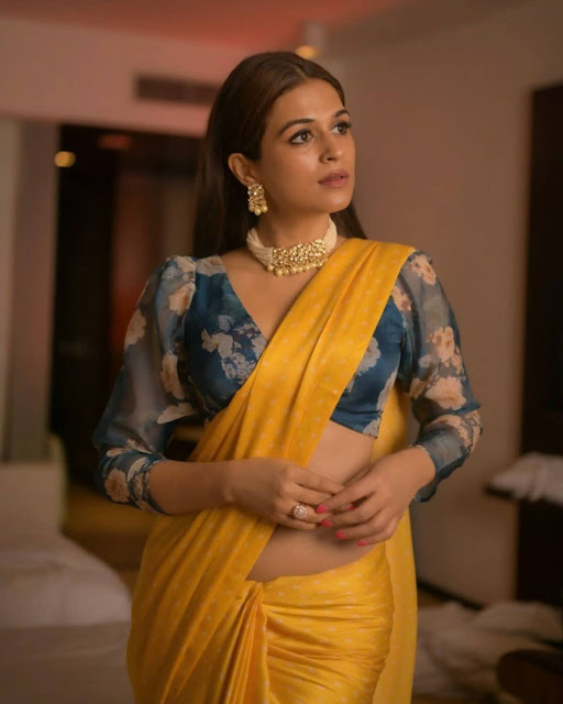 Shraddha Das in yellow satin saree and floral blouse. Buy yellow satin saree online.