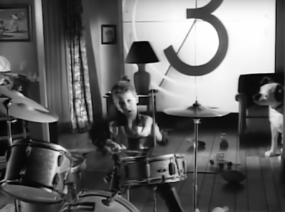 Kid playing drums