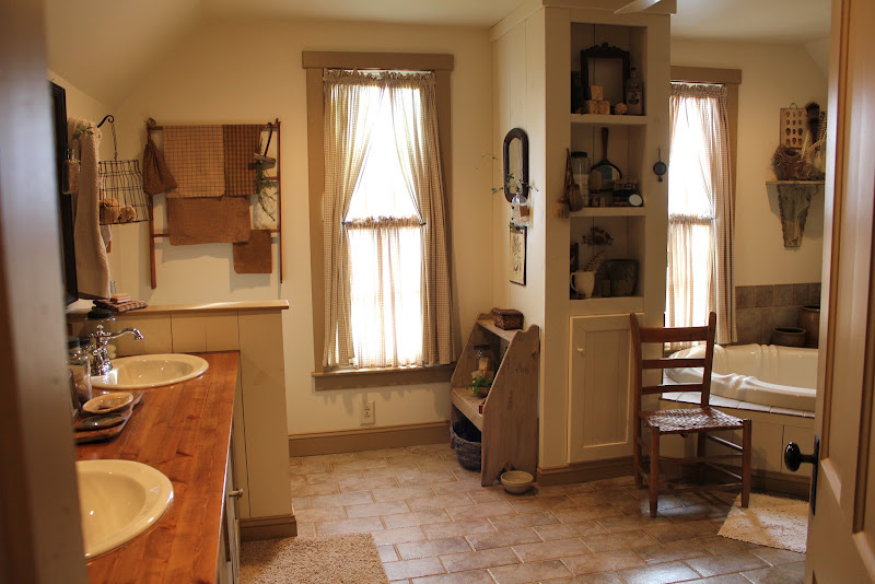 This massive bathroom was created from 2 rooms. title=