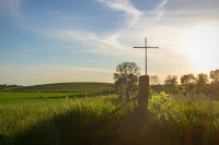 Cross in field - Photo by Jim Bonewald on Unsplash
