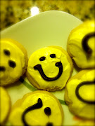 200 sugar cookies + yellow frosting + 200 chocolate smiles = 200 smiles (img )