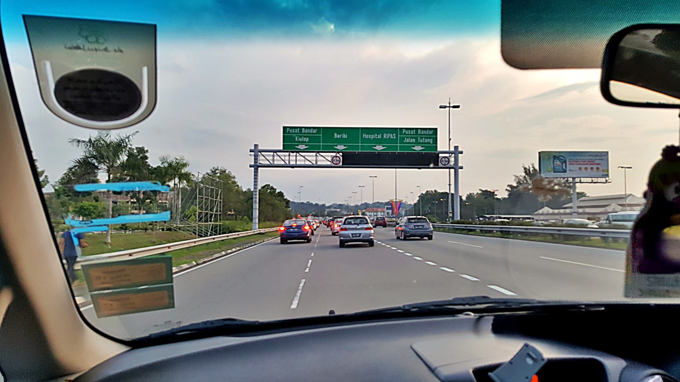 view of a portion of Lebuhraya (Highway)  Sultan Hassanal Bolkiah after emerging from the airport