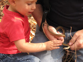 child with snake