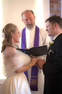 Ken and Nicole gaze lovingly at each other during their wedding ceremony at the Hollywood Schoolhouse