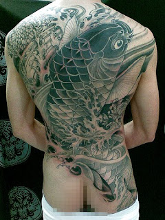 Japanese Koi Fish Tribal Tattoo Design