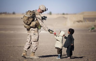 children making a difference by giving soldier apple