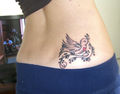 Peace tattoo design of a dove