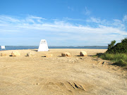 It is 8:30 and the beach is deserted except for the lady (on the . (img )