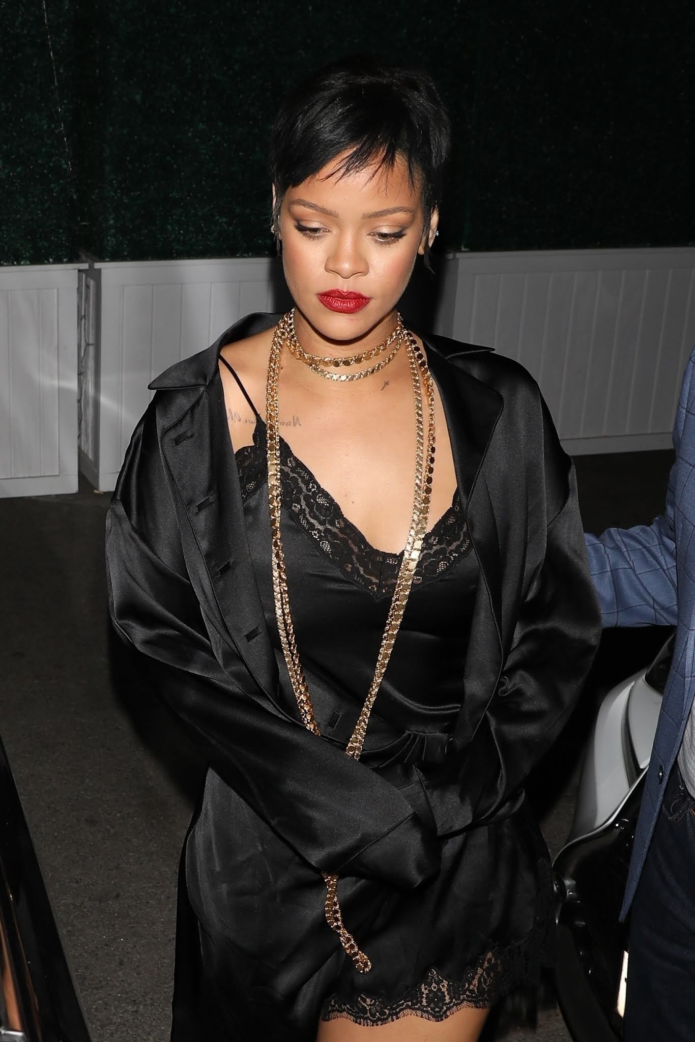 Rihanna in a slinky lingerie set for night out with friends at Delilah nightclub.