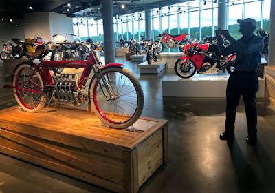 Vintage motorcycle on top of wooden crate.