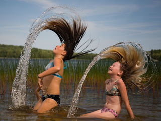 Beautiful Picture of two girls are at the Patten Pond in Maine