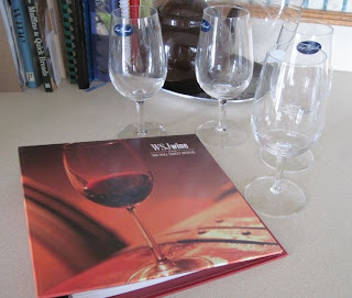 wine book and tasting glasses