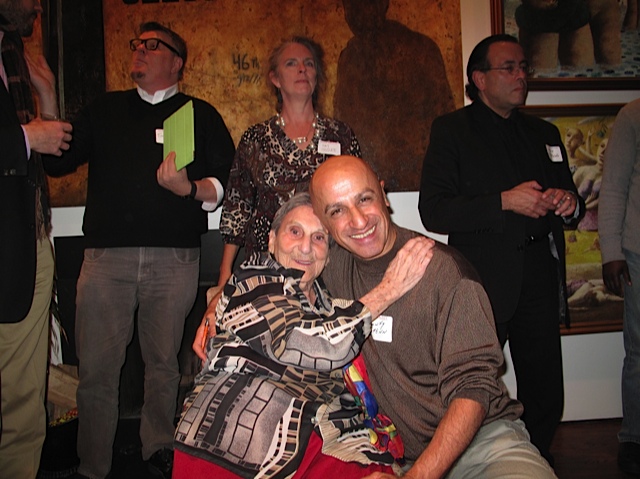 Circa 2011 - This photo was taken in 2011 at the home of a DMV art collector who threw a nice book opening party for my 100 Artists of Washington, DC book.  In the pic's background we see Andrew Wodzianski, Tim Tate, Pat Goslee, me and Victor Ekpuk's arm. In the foreground, Chawky Frenn is hugging the late, great Lida Moser!