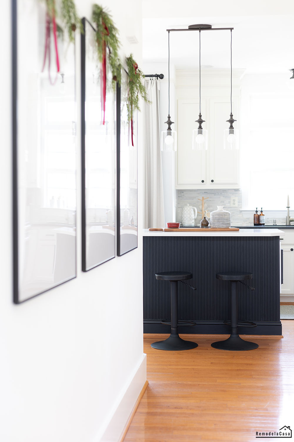 black kitchen island with pole wrap