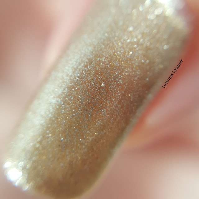 Pale bronze metallic nail polish with golden shimmer