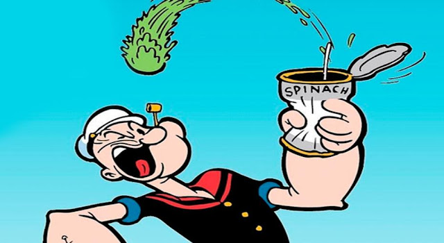 What food would the fictional sailor Popeye consume in order to instantly increase in strength?