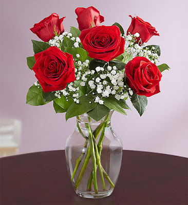 red rose in vase