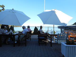 Having supper on a fine summer evening on the terrace of the Strand Hotel, Fevik, Norway