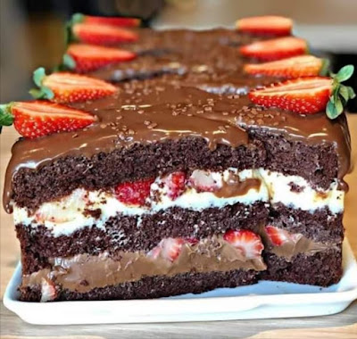 Soft chocolate cake with strawberry and condensed milk filling