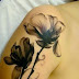 Two Flower Blossom Black Tattoo Designs on Women Arm