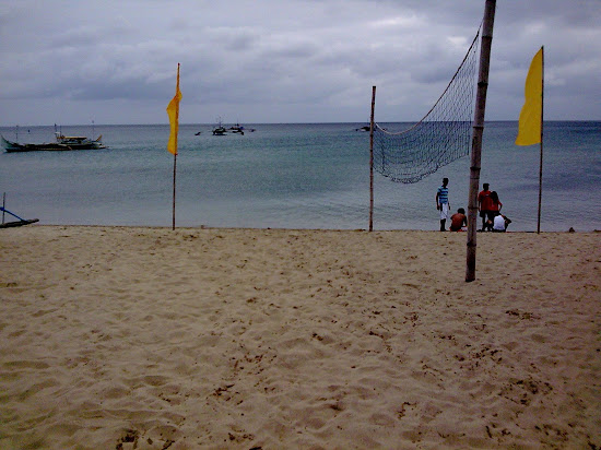 Beach volleyball net at Laiaya Aplaya