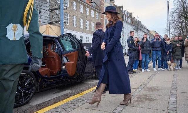 Queen Mary wore a navy blue Aignon trench coat by Fonnesbech Copenhagen, at the Museum of Danish Resistance