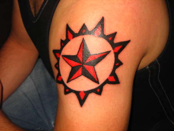 nautical star with sun tattoo design