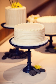 Elegant Wedding Cake Trio on Dark Cake Stands