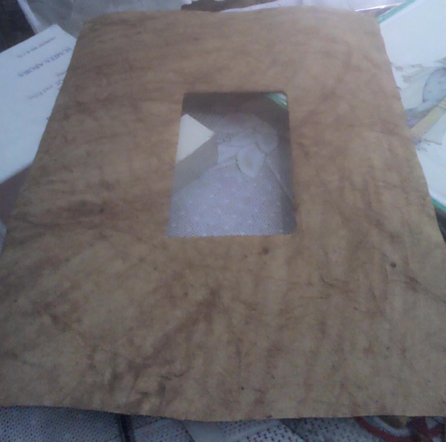 and after that i cut a handmade paper with a slits in it and pasted it ...