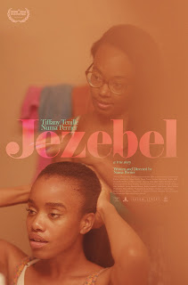 Two women, one is doing the one's hair. The text reads 'Jezebel'.