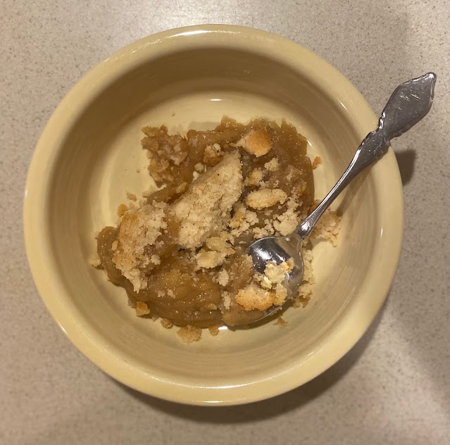 lemon bar in a bowl that looks like a crumble