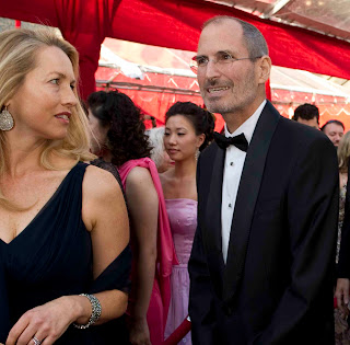 Steve jobs and Laurene Powell in party