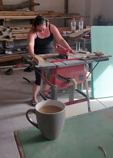 Angela using woodworking tools