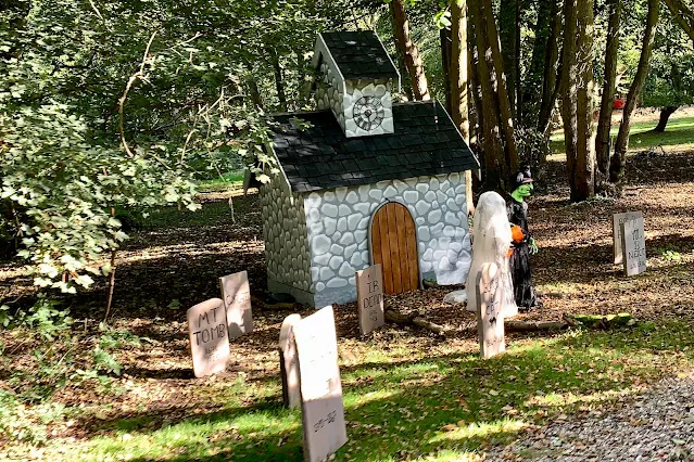 A spooky set up showing a chapel and gravestones at Audley end miniature railway